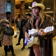 Here is the Naked Cowboy singing a Trump-themed song in the lobby of Trump Tower.